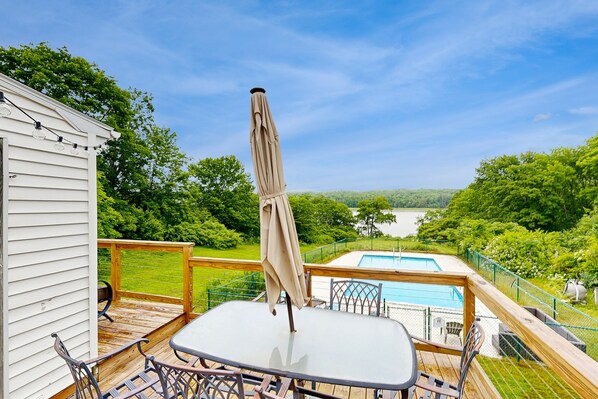 Outdoor dining - Serene Waterfront Home with In-Ground Pool, River Views, Spacious Deck, & Grill (Winterport)