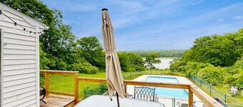 Serene Waterfront Home with In-Ground Pool, River Views, Spacious Deck, & Grill