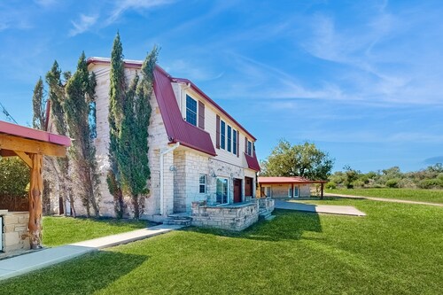 4-bedroom spacious home with guest house & pool, located on 9 acres of land