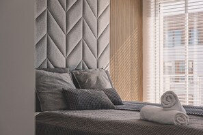 1 habitación, tabla de planchar con plancha, wifi gratis y ropa de cama 