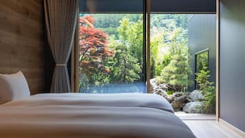 Suite, diversos llits, bany privat, vistes al jardí | 1 dormitori, habitacions insonoritzades i wifi gratuïta