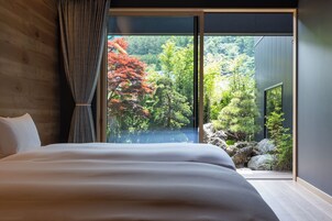 套房, 多张床, 私人浴室, 花园景观 | 隔音、免费 WiFi