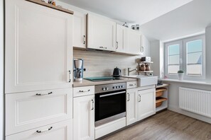 Fridge, oven, stovetop, coffee/tea maker