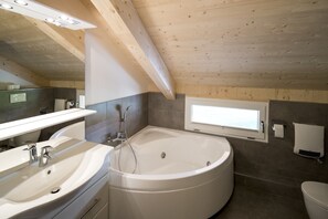 Een douche, een bubbelbad, een haardroger