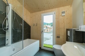 Shower, jetted tub, hair dryer