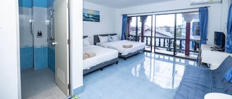 Comfort Quadruple Room, Balcony, City View | Down duvets, in-room safe, blackout curtains, free WiFi