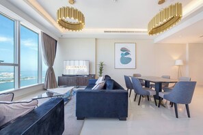 Lägenhet Superior - 2 sovrum - havsutsikt - mot havet | Vardagsrum | 52-tums platt-tv med digitalkanaler, Netflix och Hulu