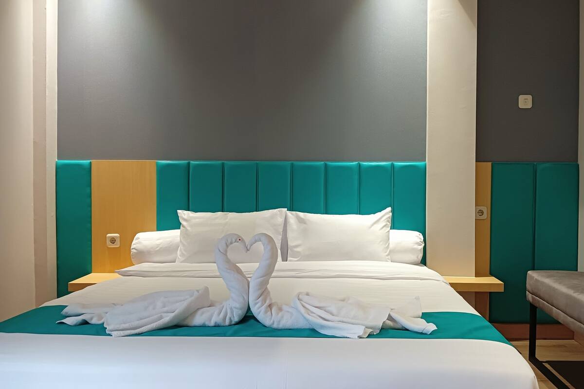 Deluxe Double Room, Balcony, City View | Desk, laptop workspace, free WiFi