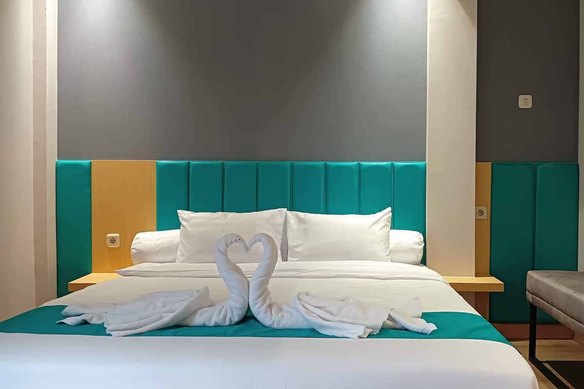 Deluxe Double Room, Balcony, City View | Desk, laptop workspace, free WiFi