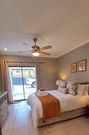 Luxury Studio Suite, Patio, Courtyard View | In-room safe, blackout drapes, iron/ironing board, free WiFi - BOOM69 Guesthouse (Ngwathe)