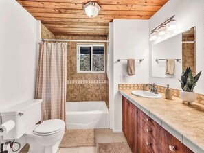 Jetted bath, hair dryer, towels, soap