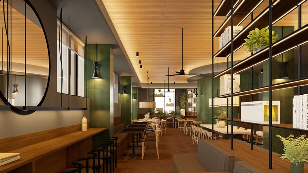 A modern restaurant interior with wooden floors, high tables, and chairs. There are shelves with books and plants, and a large mirror on the wall. - B&B Hotel Alicante Centro (Alicante)