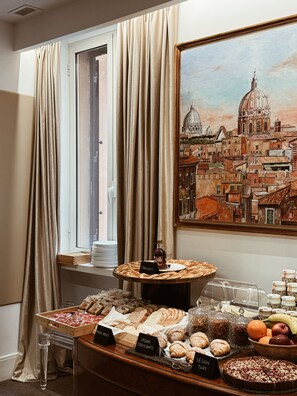 A breakfast buffet with labeled sections for vegan and gluten-free options, a painting of a cityscape, and a window with curtains. - Residenza Imperiale - Luxury Guest House (Rome)