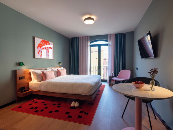 Premium bedding, in-room safe, laptop workspace, soundproofing