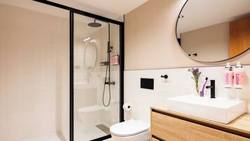 Shower, hair dryer, towels, soap