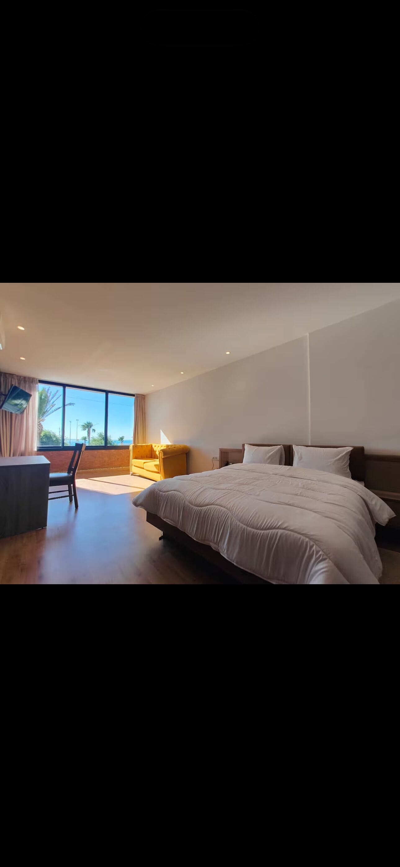 Chambre Deluxe, 1 chambre, vue plage | Coffres-forts dans les chambres, bureau