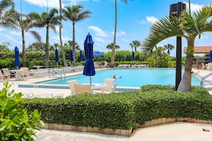 A heated pool - Beachfront 2BR/2BA condo with heated pool, WiFi, and full kitchen. (Marco Island)