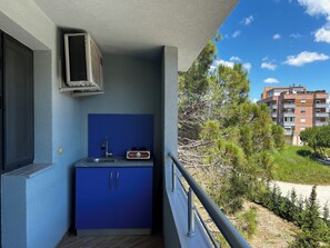 Triple Room, Garden View | Street view - Canary Hotel (Golem)