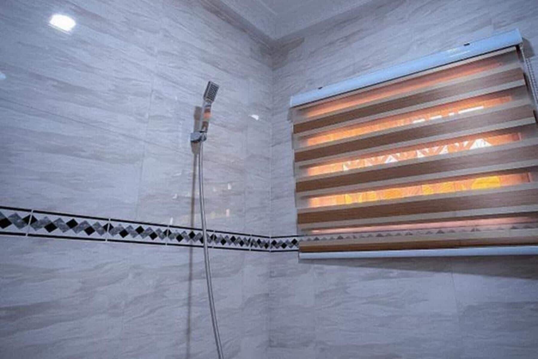 Separate tub and shower, deep soaking tub, towels