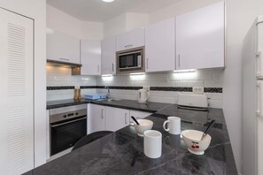 Fridge, microwave, oven, stovetop