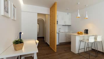 Mini-fridge, microwave, stovetop, espresso maker