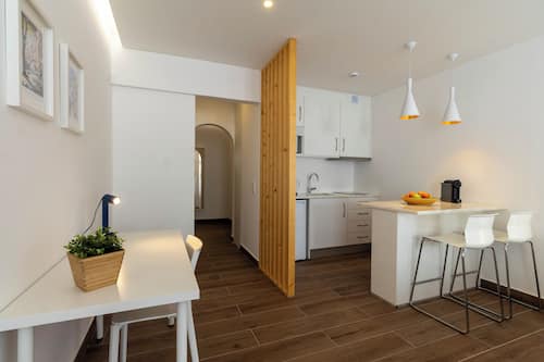 Mini-fridge, microwave, stovetop, espresso maker