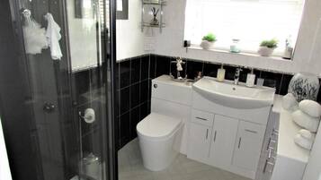 Hair dryer, towels, soap, shampoo