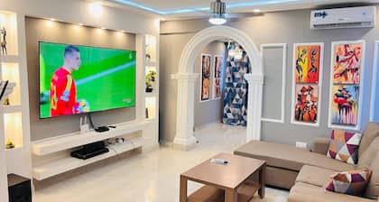 Spacious 3-bedroom Apartment with WiFi /AC in Tema.