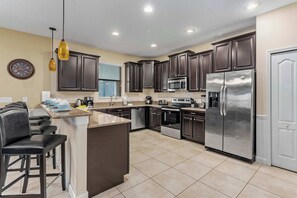 Fridge, microwave, oven, stovetop - ChampionsGate villa w/ pool, hot tub & games (Davenport)