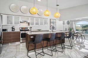 Oven, stovetop, coffee/tea maker, cookware/dishes/utensils - The Mellow Mango  Relaxing 2BR Getaway with Hot Tub, Dock & Cabana Club Access in Key Colony Beach (Key Colony Beach)