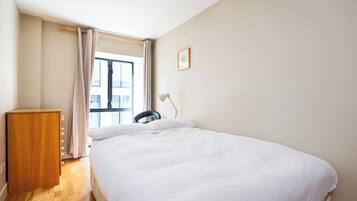 2 bedrooms, desk, iron/ironing board, travel crib