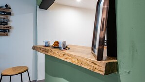 A wooden counter with a framed mirror, two mugs, and a croissant. - Douce vie en Provence  (Malaucène)