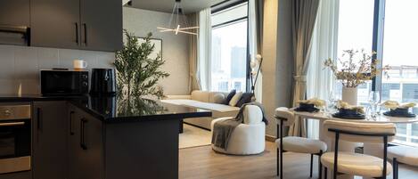 Deluxe Apartment, City View | Private kitchen | Microwave, oven, stovetop, cookware/dishes/utensils