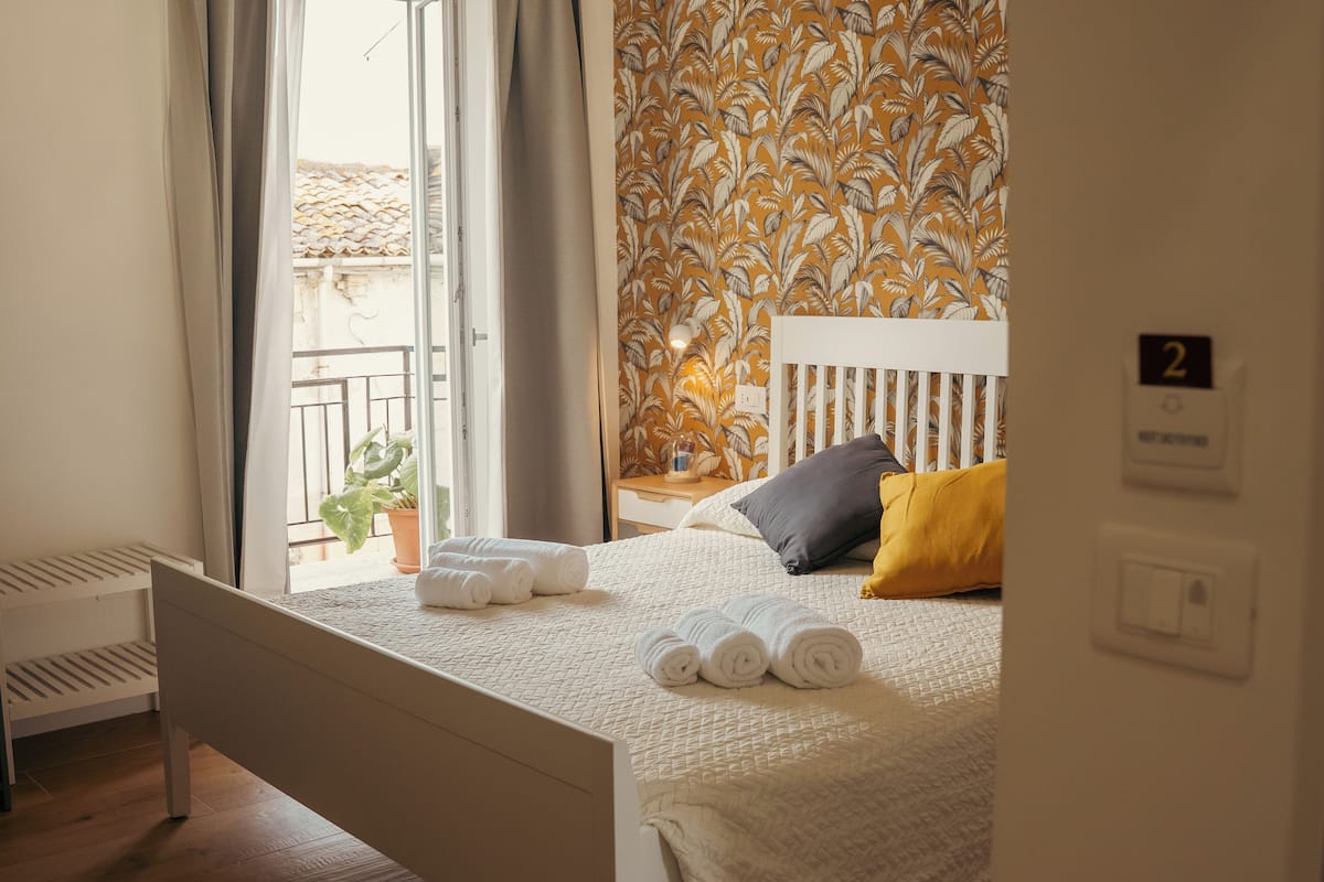 Comfort Room, Balcony, City View | In-room safe, desk, blackout drapes, WiFi (free)