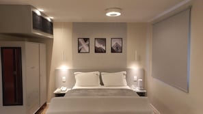 Comfort Room, City View | 1 bedroom, in-room safe, iron/ironing board, free WiFi