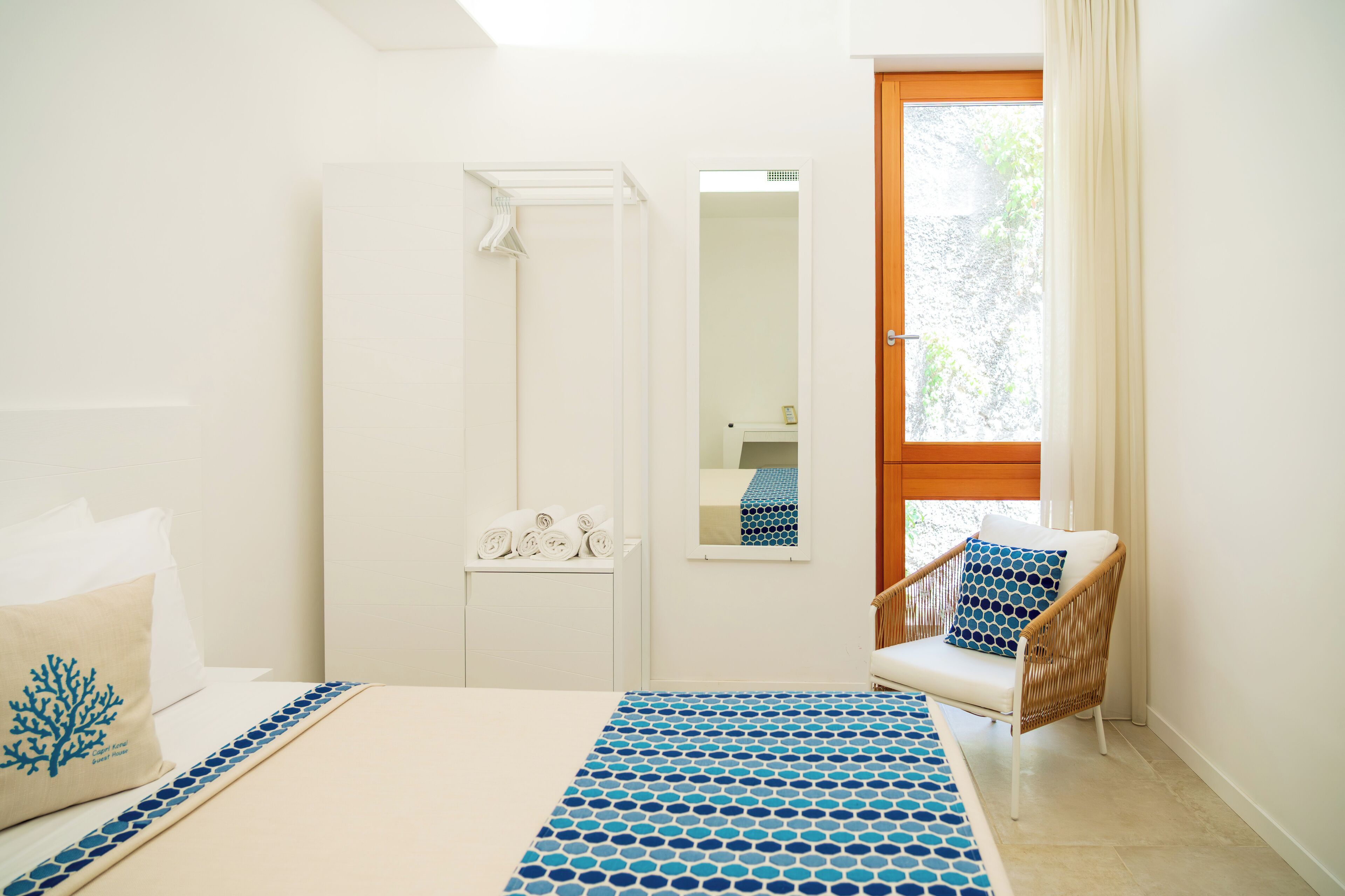 Deluxe Room, Patio, Courtyard View | In-room safe, iron/ironing board, free WiFi