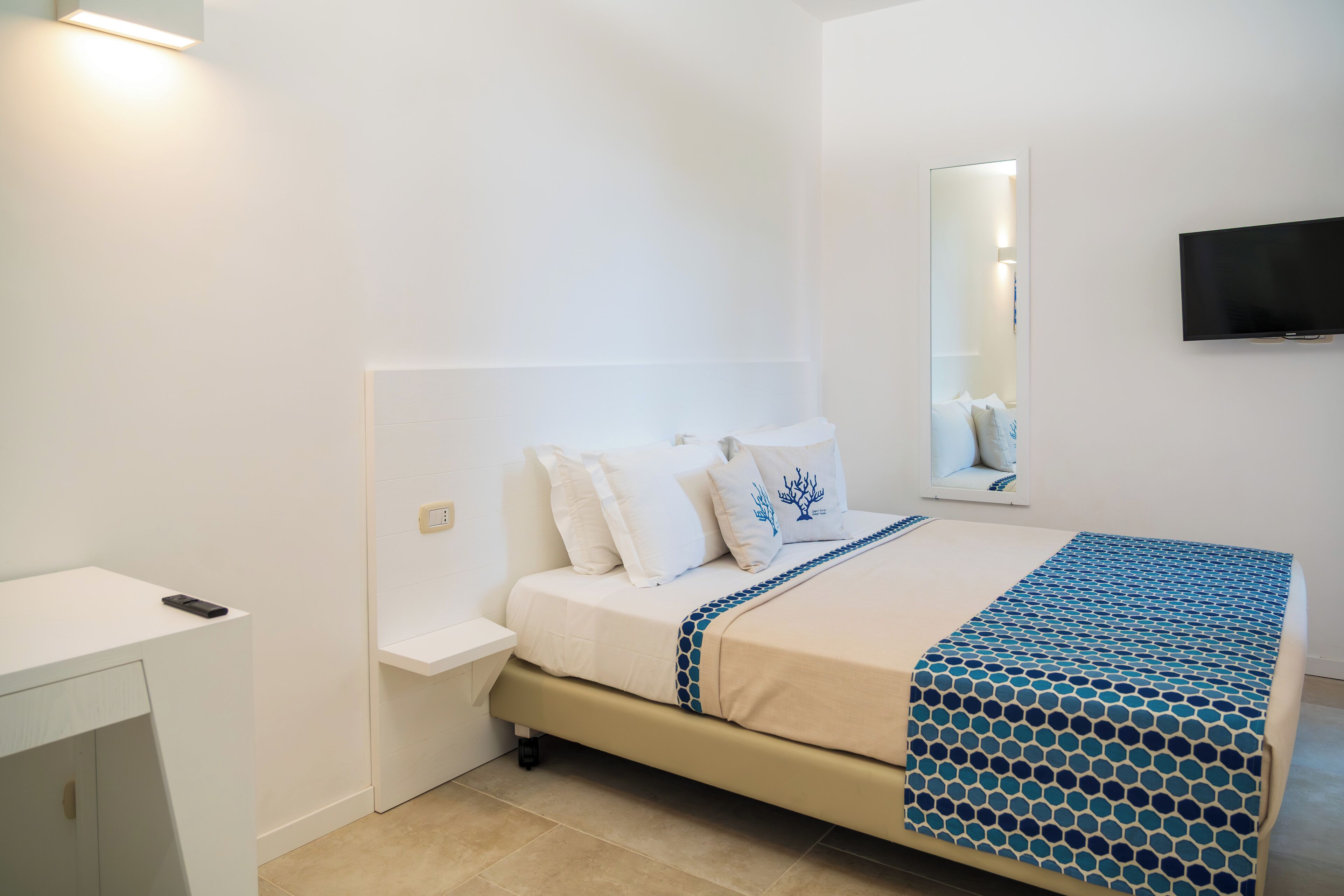 Comfort Room, Patio, Courtyard View | In-room safe, iron/ironing board, free WiFi