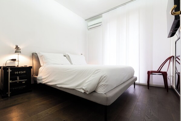 Căn hộ Deluxe, ban công, quang cảnh sân vườn | 1 phòng ngủ, bộ đồ giường cao cấp, màn/rèm cản sáng, phòng cách âm