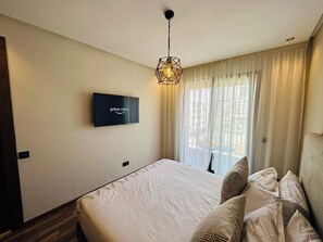 Departamento Confort, balcón, vista a la ciudad | 1 habitación, tabla de planchar con plancha y wifi gratis 