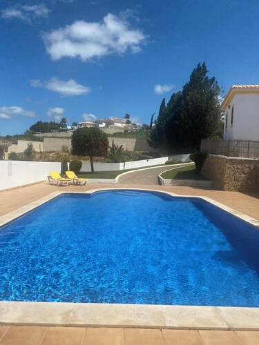 Albufeira holiday villa with large sun terrace shared pool and quiet location, 