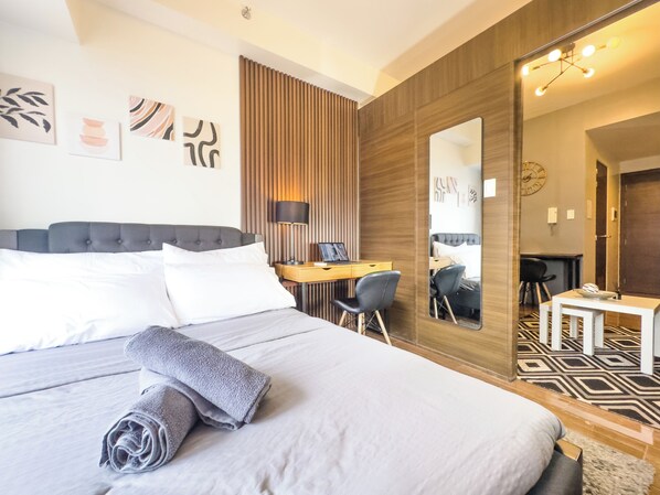 1 dormitorio, tabla de planchar con plancha, wifi y ropa de cama