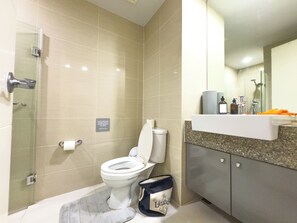 Hair dryer, bidet, towels, soap