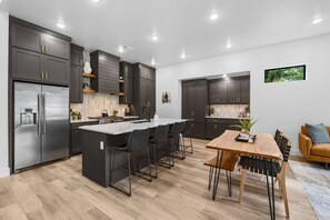 Fridge, microwave, oven, stovetop - Elevated Chalet with Hot Tub Scenic Views & Trail Access (Bella Vista)