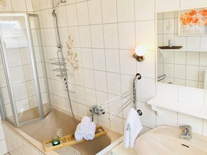 Hair dryer, towels, soap, toilet paper