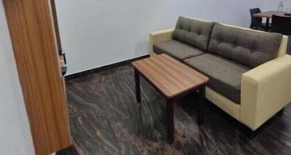 Cozy 1-bedroom with AC and WiFi in peaceful Dindigul/Mymoon service apartment