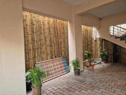 Cozy 1-bedroom with AC and WiFi in peaceful Dindigul/Mymoon service apartment
