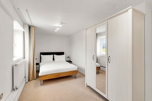2 slaapkamers, een strijkplank/strijkijzer