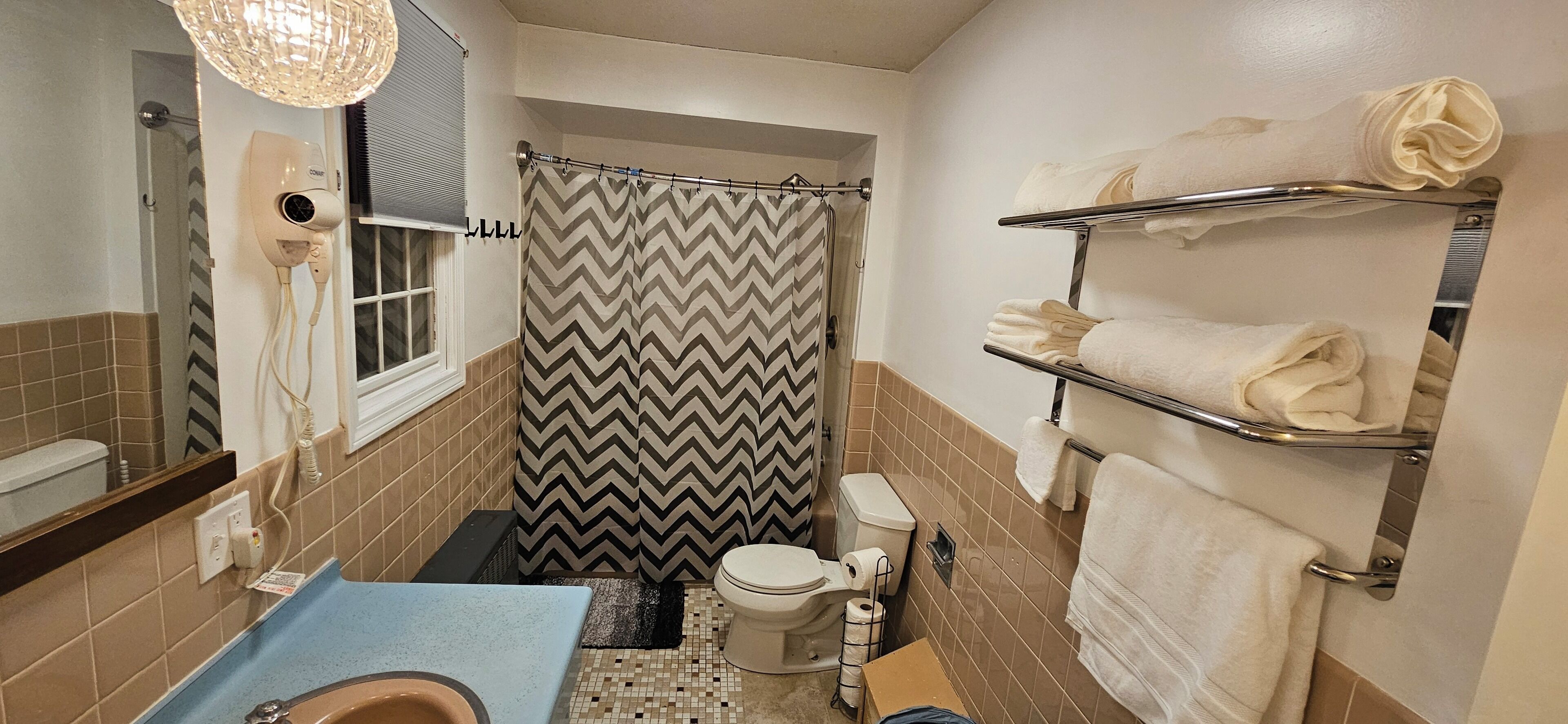 Hair dryer, towels, soap, shampoo