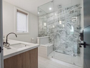 Shower, eco-friendly toiletries, hair dryer, towels