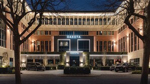A hotel entrance with "Dakota" signage, a parking area, and a well-lit facade. - Dakota Newcastle (Newcastle-upon-Tyne)